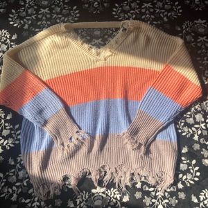 multi-colored distressed sweater